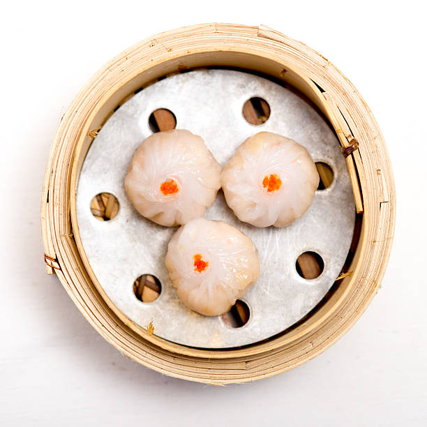 istock yumcha, dim sum in bamboo steamer, chinese cuisine 469903506