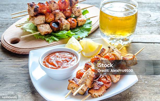 Grilled Chicken Skewers With Cherry Tomatoes Stock Photo - Download Image Now - Barbecue - Meal, Beer - Alcohol, Chicken - Bird