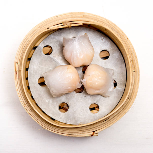 istock yumcha, dim sum in bamboo steamer, chinese cuisine 469907440