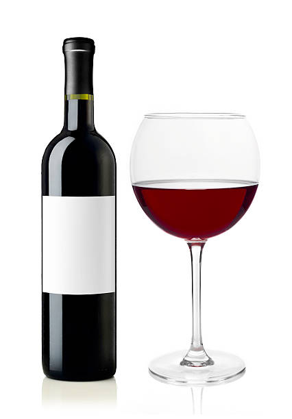 istock Red wine bottle and glass 469907746
