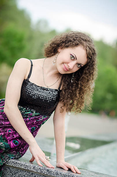 istock Beautiful woman outdoors in summer forest 469908428