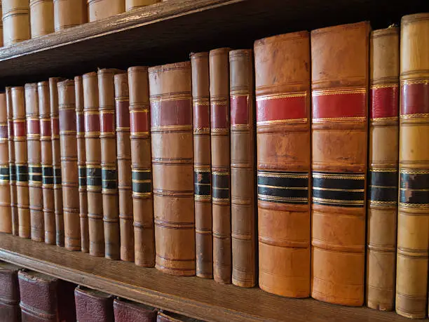 old books on shelves in library