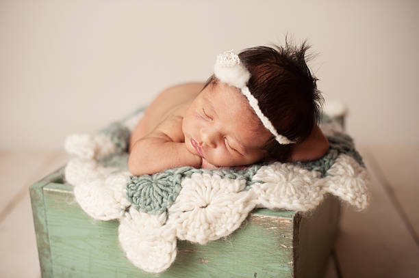 istock Sleeping Newborn Girl 469909403