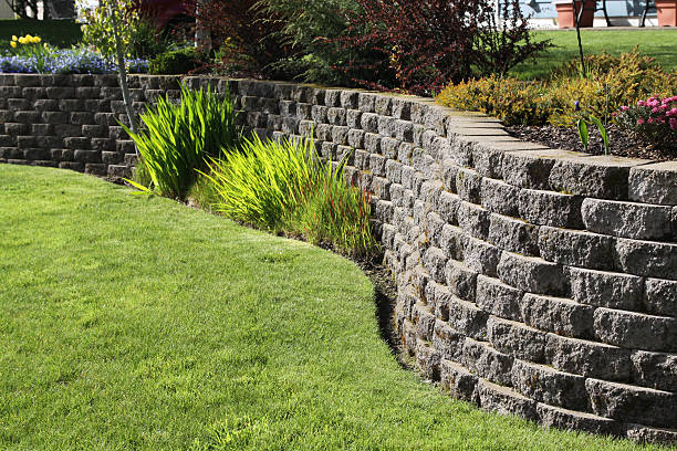 Landscaped Wall Of Cement Cobblestone Bricks stock photo