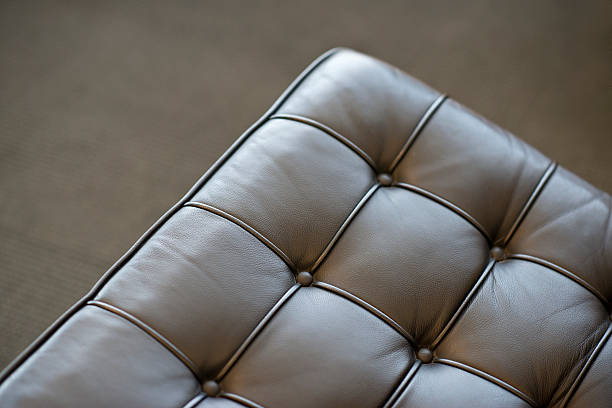 Leather Bench Leather bench in an modern office leather cushion stock pictures, royalty-free photos & images