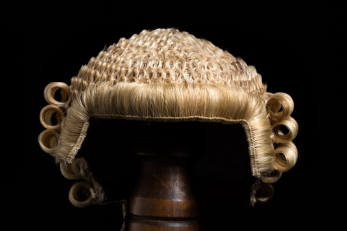 Front view of an antique horsehair lawyer's wig