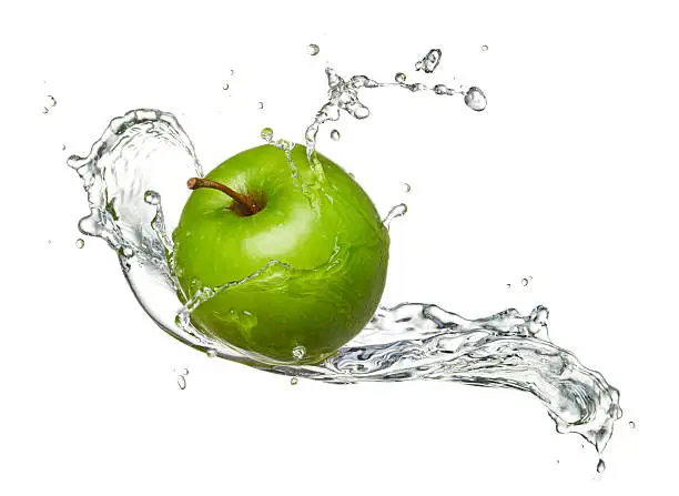 Photo of Water-splashed Granny Smith apple