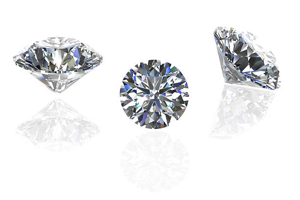 istock Three Faceted Diamonds Isolated on White - Stock Image 469910288