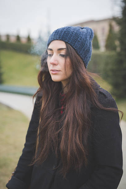 Winter fashion - beautiful young women wearing fur coat