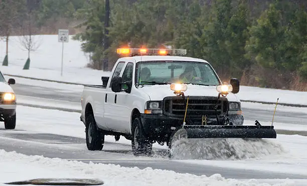 Georgia highway being cleared by a snowplow.  Please see my portfolio for other weather related images.