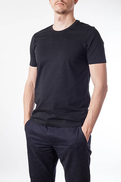 istock Image of a man in a blank black t-shirt 469912502