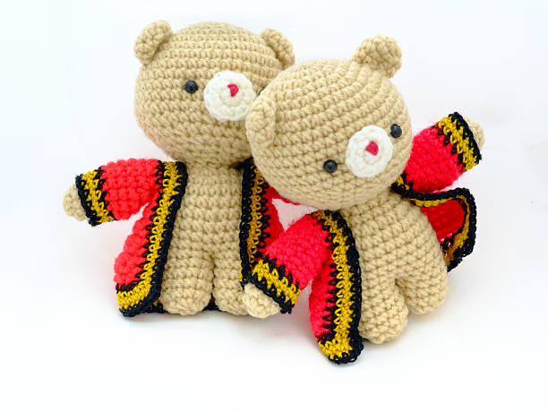 istock pair of doll from knitting wool 469915256