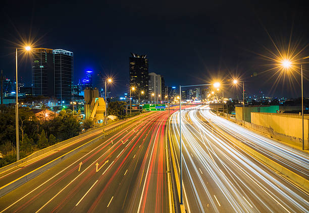 istock Light trails and busy traffic on West Gate Freeway 469916295