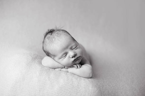 istock Sleeping Newborn Girl 469916443