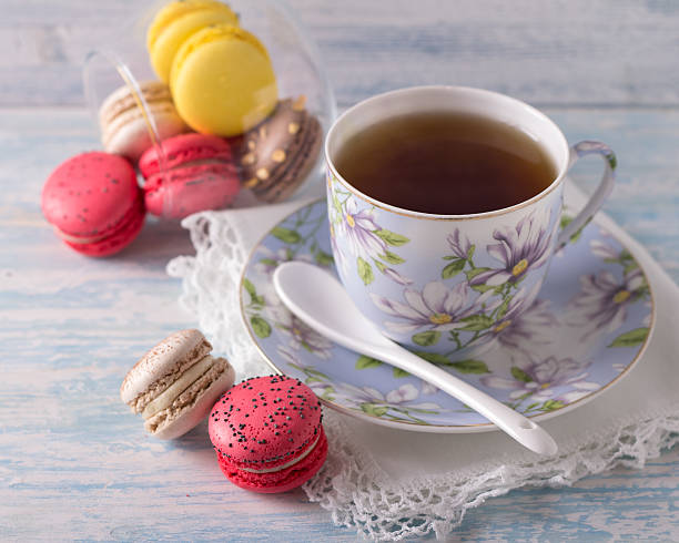 istock French Macarons with cup of tea 469916820