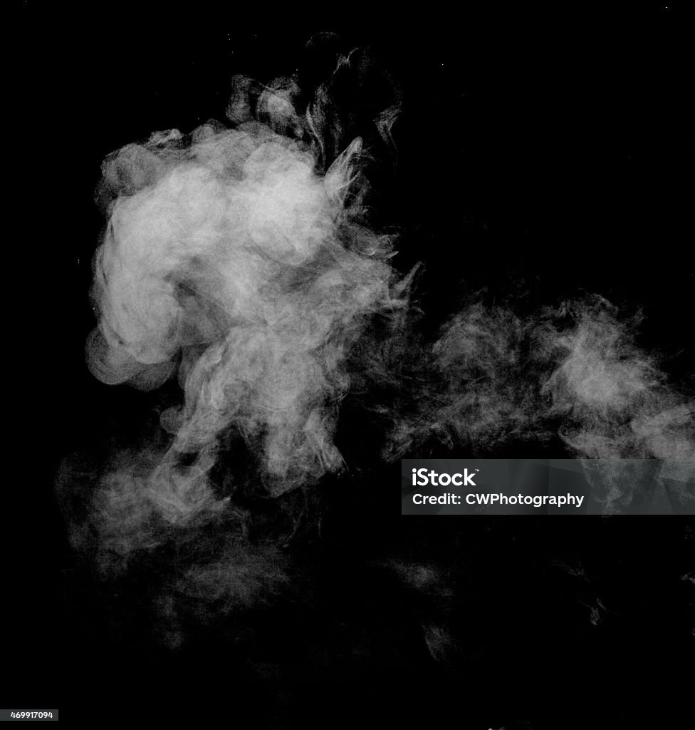 Steam cloud against a black background. 2015 Stock Photo