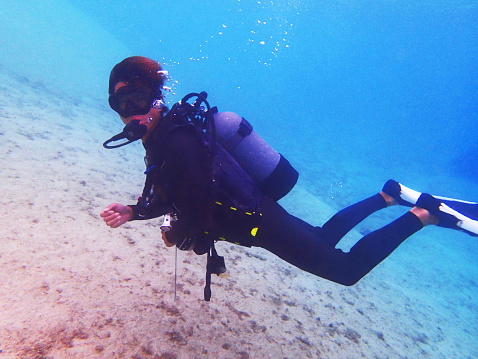 Male diver to scuba diving