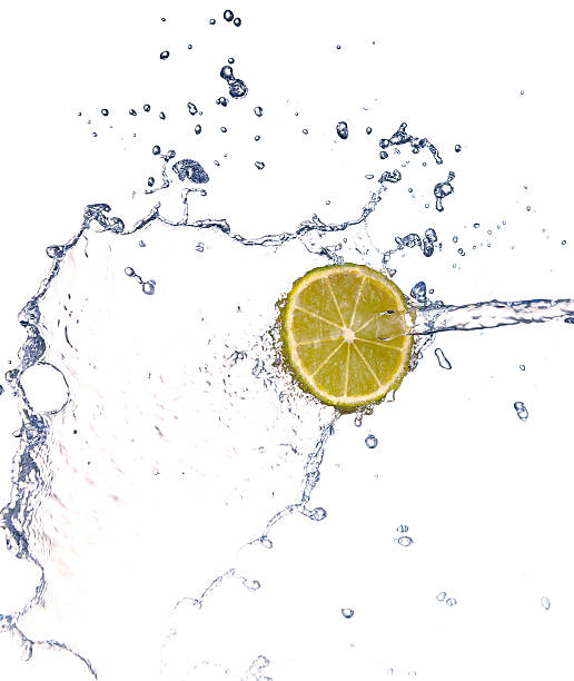 istock lime in spray of water. lime cucumber with splash 469917614