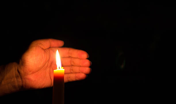 istock Protect candle burning in the dark. 469917724