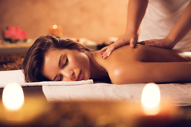 istock Beautiful woman having a massage at the spa. 469917768