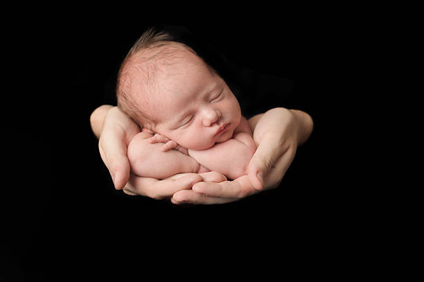 istock Sleeping Newborn Girl 469917835