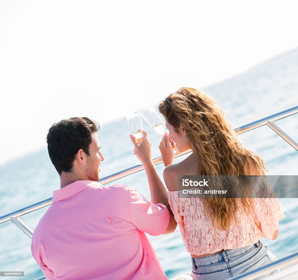 Couple on a romantic date at a yacht Couple on a romantic date at a yacht sailing the Caribbean 2015 Stock Photo