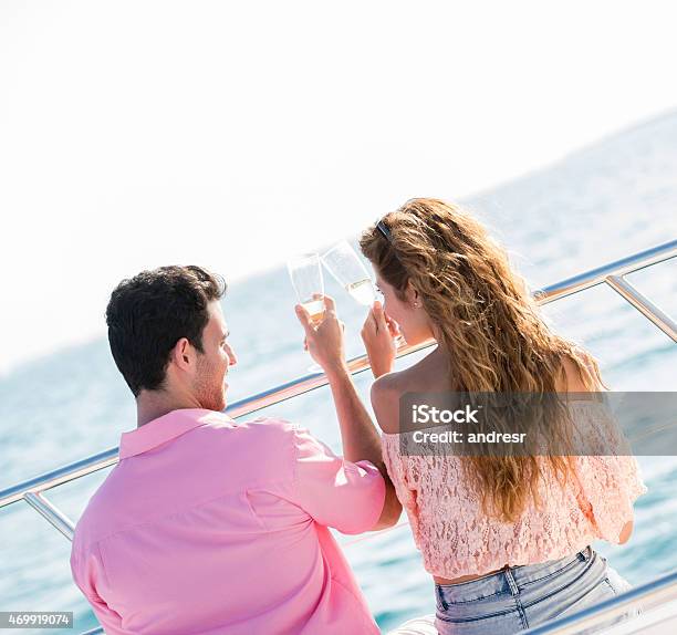 Couple On A Romantic Date At A Yacht Stock Photo - Download Image Now - 2015, Adult, Beautiful People