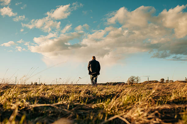 istock Man and his chihuahua at sunset 469919214