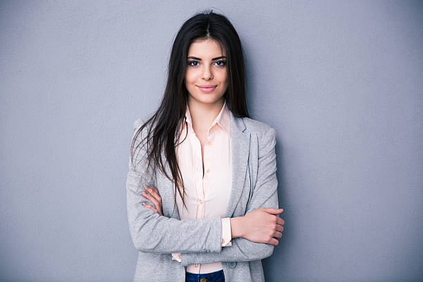 istock Beautiful cute woman with arms folded 469923494