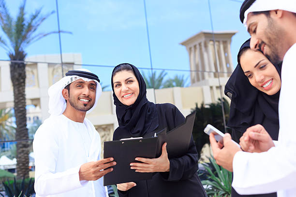 istock Four arab business people outside 469924246