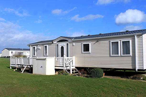 White caravans in a park White caravans in a modern trailer park, Scarborough, England. manufactured housing stock pictures, royalty-free photos & images