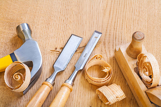istock set of woodworking tools chisel hammer plane on wooden board 469931226
