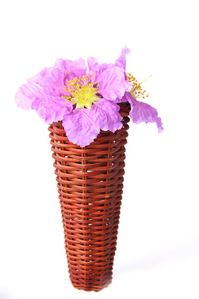 istock flowers in a wooden vase - Stock Image 469931232