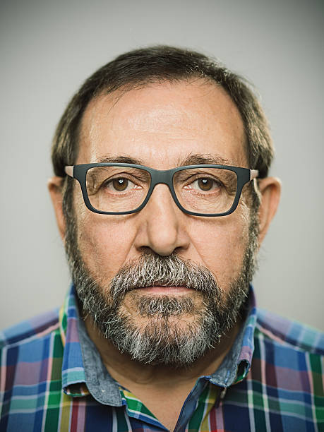 istock Portrait of a real spanish man with glasses and beard. 469932108