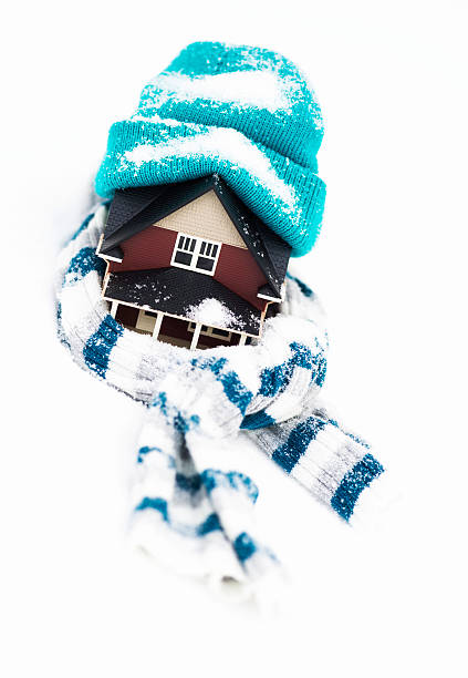 istock House Wrapped in Winter Clothing; Insulate Your Home 469932193