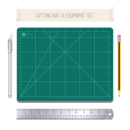 Cutting Mat and Equipment Set. Isolated on White Background. Clipping paths included in additional jpg format.