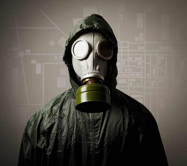 istock Gas mask and a city map 469935401