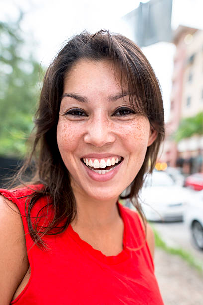 istock Smiling young hispanic woman (real people) 469936015