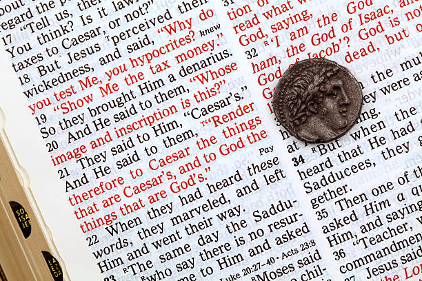 Scripture in Matthew Jesus and Caesar Coin Matthew Chapter 12 scripture about Jesus and the lesson with Caesar's coin. augustus caesar photos stock pictures, royalty-free photos & images
