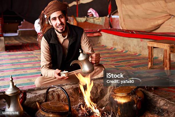 Bedouin Man In Wadi Rum Tent Stock Photo - Download Image Now - Jordan - Middle East, Bedouin, Wadi Rum