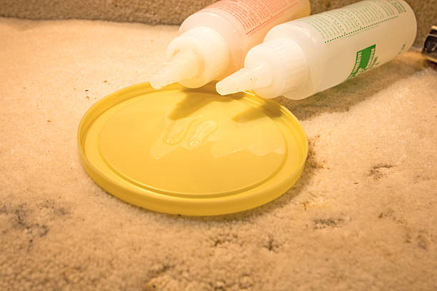 DIY- how to mix a two part epoxy glue DIY- Mixing a two part epoxy glue. From the view of the person doing this project. epoxy resin stock pictures, royalty-free photos & images