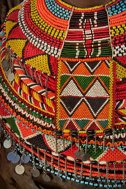 Detail of a beaded necklace worn by a tribal woman from Kenya.