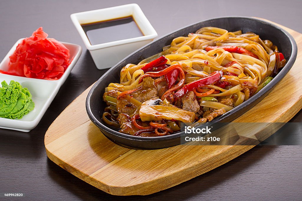 Udon (thick wheat noodles) with meat and vegetables 2015 Stock Photo