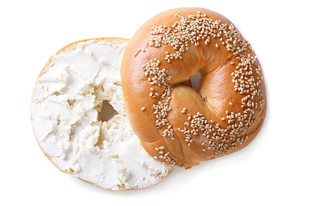 istock bagel with cream cheese isolated on white background 469942932