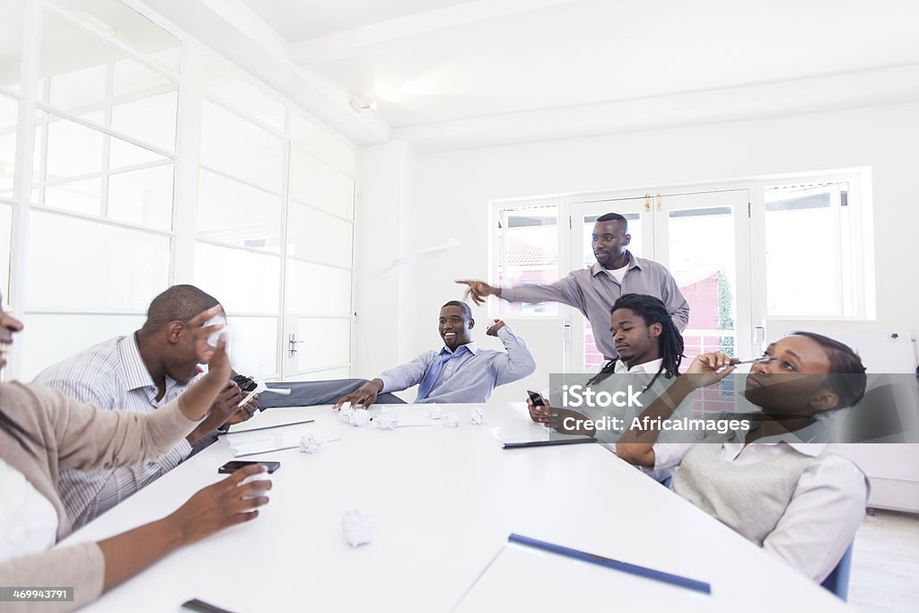 Bored african business colleagues at work Bored african business colleagues at work, in Cape Town, South Africa. Humor Stock Photo