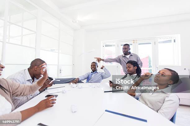 Bored African Business Colleagues At Work Stock Photo - Download Image Now - Humor, Wasting Time, 20-29 Years