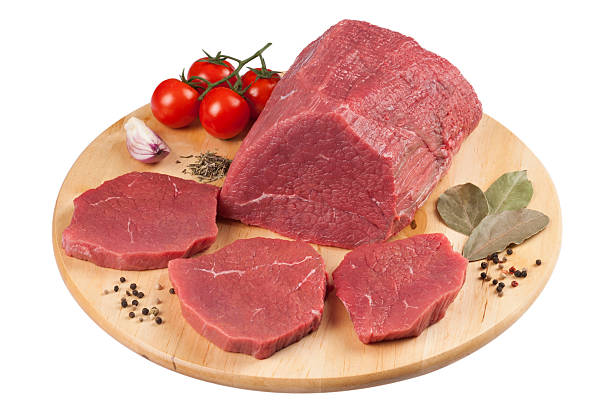 istock Huge red meat and steak on wood table 469944075