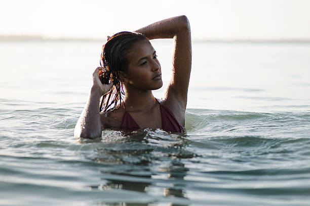 istock Woman at the beach 469944537