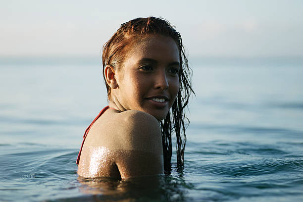 istock Woman at the beach 469944543