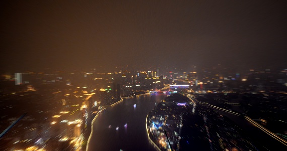 Guangzhou blurred neon lighten cityscape at night, Viewed from the Canton Tower, a 600-metre tall observation tower and Guangzhou's main landmark.